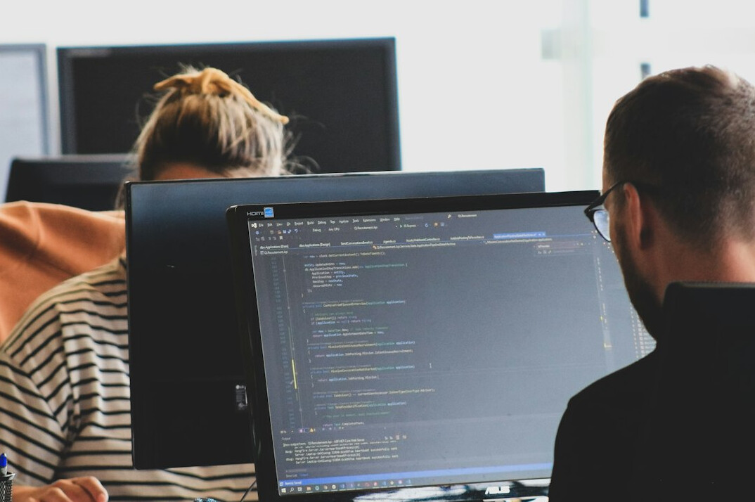 developers reviewing code